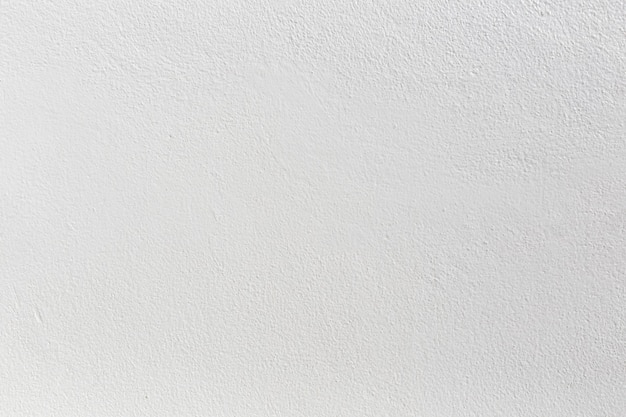 Vieux fond de texture de mur blanc grunge.