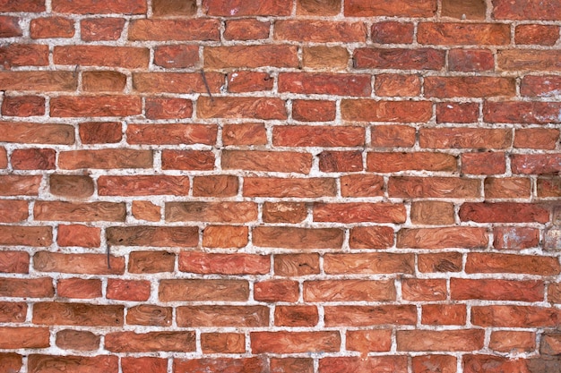 Vieux fond de texture de mur de brique patiné pour la conception ou l'intérieur