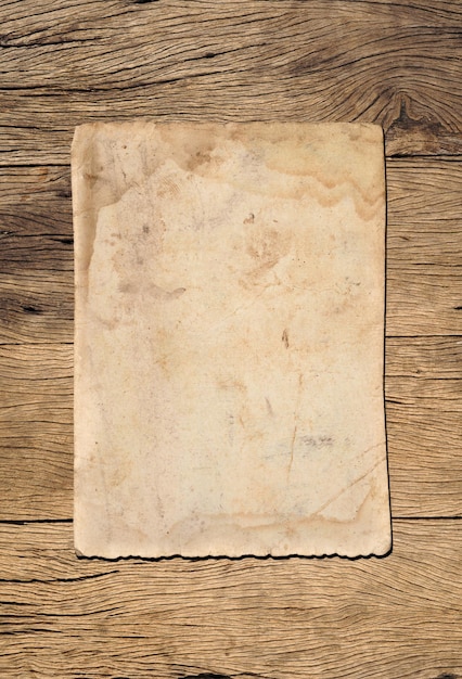 Photo vieux fond de texture de papier vintage sur planche de bois
