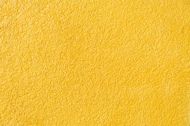 Vieux grès de texture de fond de mur de pierre jaune