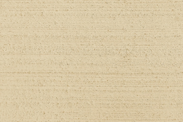 Vieux mur de béton beige