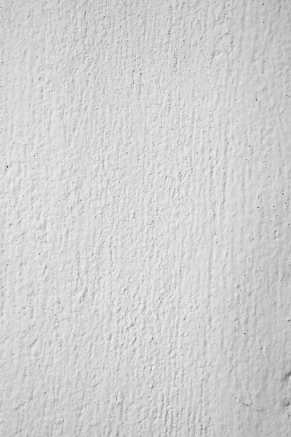 Vieux mur de béton blanc clair Dans le mur de ciment de couleur noir et blanc mur de fond de mur cassé texture verticale