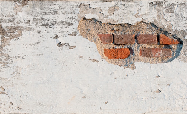 Vieux mur de béton blanc