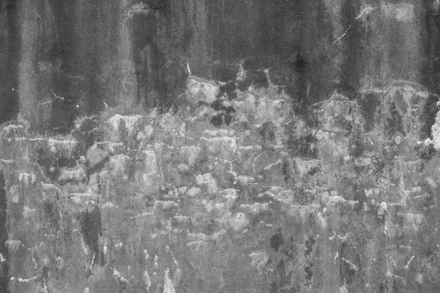 Vieux mur de béton dans la texture de fond de mur cassé de mur de ciment de couleur noir et blanc