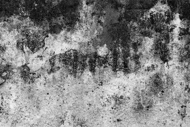 Vieux mur de béton endommagé avec une texture grunge lourde