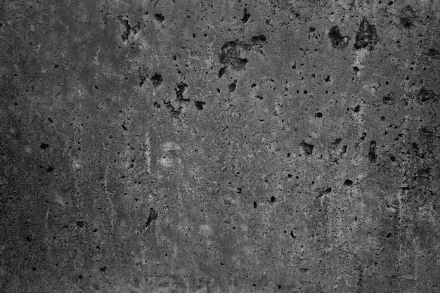 Vieux mur de béton gris foncé. Fond grunge