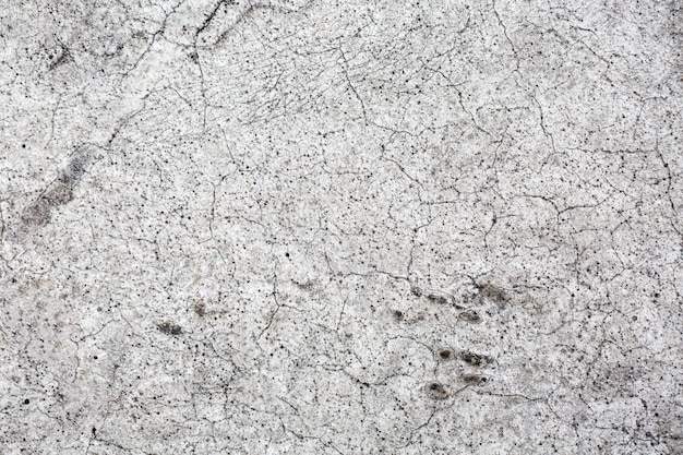 Vieux mur de béton gris