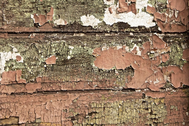 Vieux mur en bois avec peinture écaillée. Texture. Fond