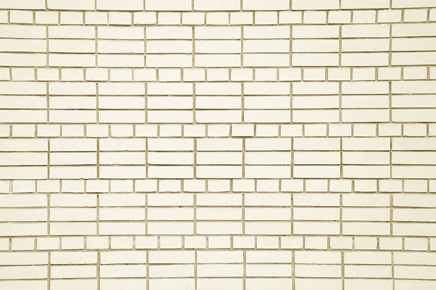 Vieux mur de brique beige