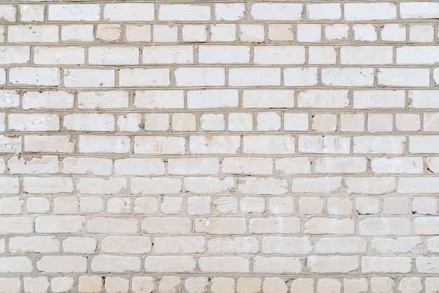 Vieux mur de briques blanches Fond vintage de brique de construction