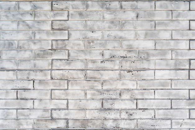 Vieux mur de briques en brique de silicate blanc