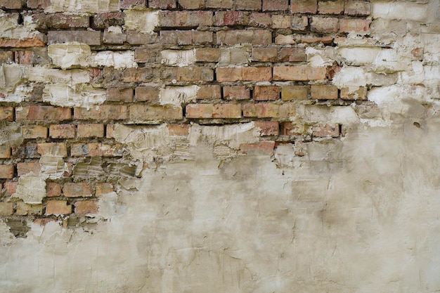 Vieux mur de briques Maçonnerie d'une vieille brique de style rustique La structure et le modèle de détruit