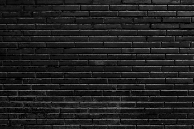 Vieux mur de briques noires texture. Fond d'écran sombre