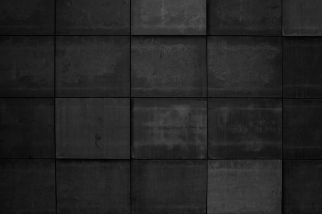 Photo vieux mur de briques noires texture. fond grunge