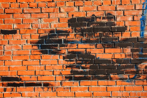 Vieux mur de briques avec de la peinture