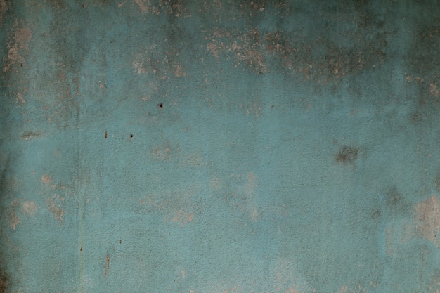 Vieux mur de ciment peinture couleur abstrait bleu.