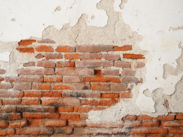 Vieux mur fait de mur de briques