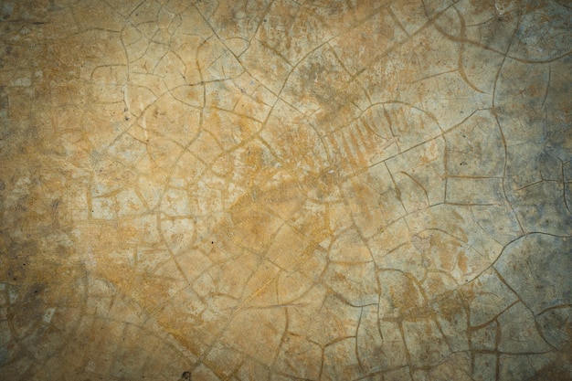 Vieux mur de plâtre poli avec des fissures