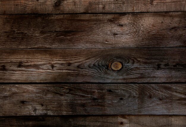 Vieux panneau de fond en bois avec des clous rouillés texture bois
