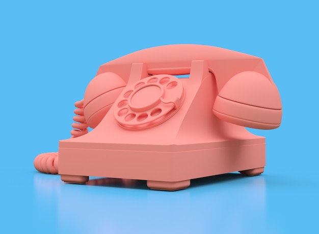 Vieux téléphone à cadran rose sur une surface bleue