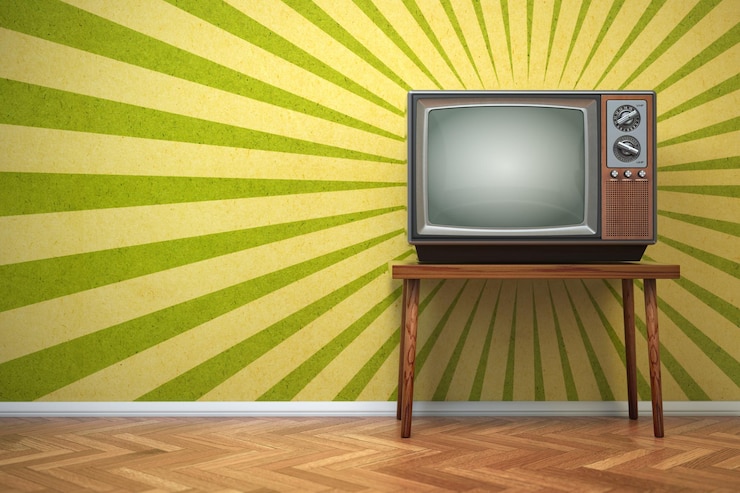 Photo un vieux téléviseur rétro sur le fond vintage