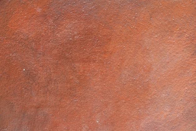Vieux texture de ciment orange avec fissure