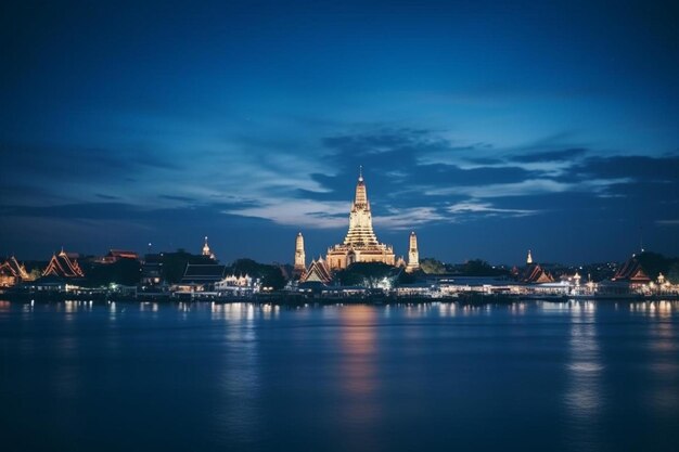 Photo une ville la nuit avec un grand bâtiment en arrière-plan