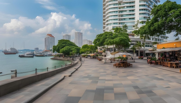 Photo une ville avec un plan d'eau et un bâtiment en arrière-plan