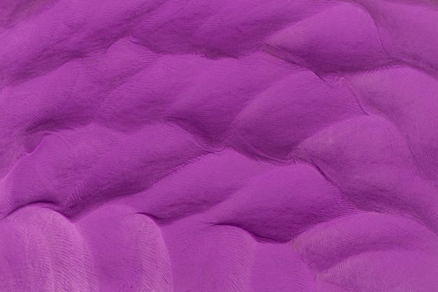 violet texture pâte à modeler fond argile coloré