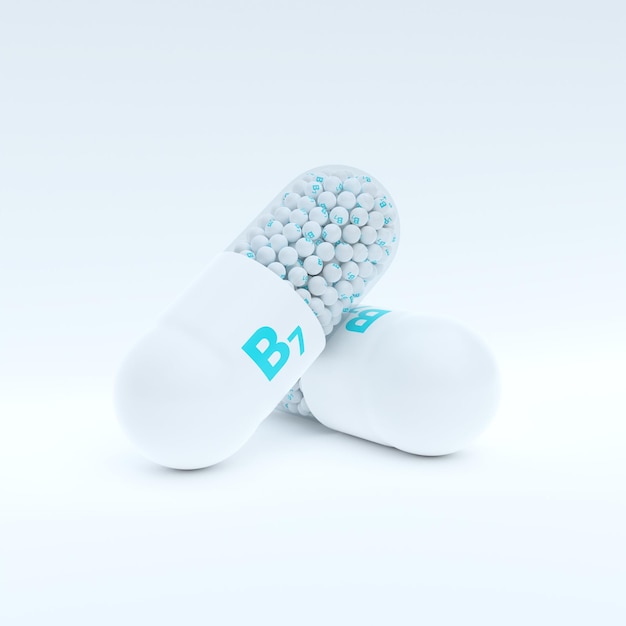 Vitamine B7 avec granules de capsule turquoise blanche et fond blanc