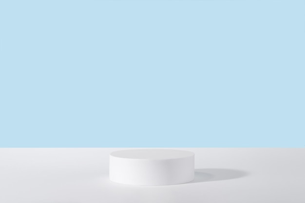 Vitrine pour la présentation de bijoux plate-forme blanche pour la publicité de parfum cosmétiques stand fond maquette de scène de marque Socle de podium pour l'emballage de produits cosmétiques sur bleu