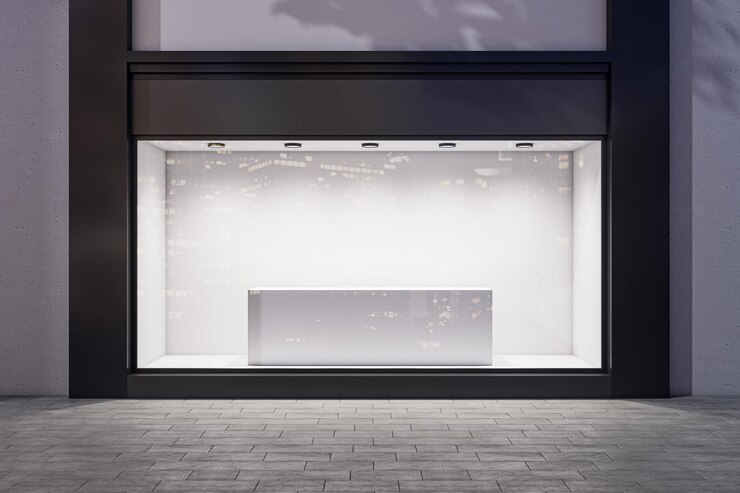 Photo une vitrine avec un présentoir blanc au milieu.