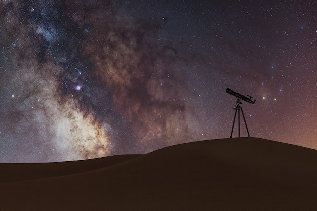 Voie lactée avec petit télescope dans le désert