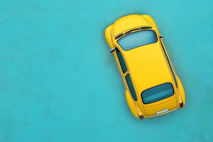 Une voiture jaune vif partiellement submergée dans l'eau turquoise tranquille sur une journée d'été calme