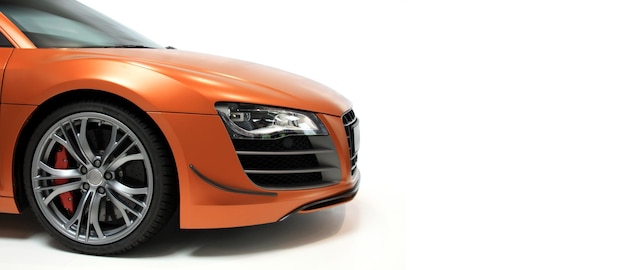 Voiture rouge et orange sportive de luxe rapide Photo