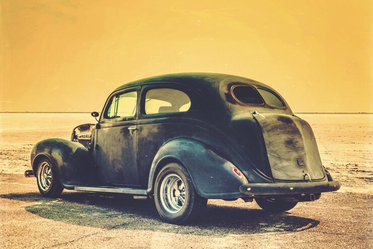 Photo une voiture vintage sur la plage contre le ciel