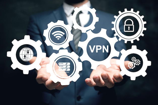 VPN et icônes d'engrenage Le concept de contournement de l'interdiction Homme tenant dans sa main