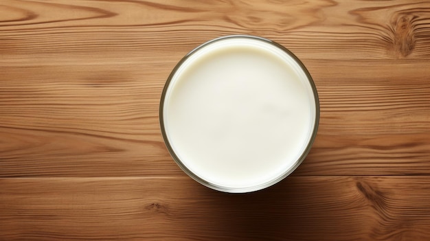 Vue aérienne du lait sur table en bois verre de lait basse résolution