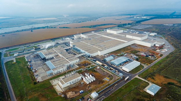Vue aérienne de la grande usine industrielle Construction d'usine d'entrepôt