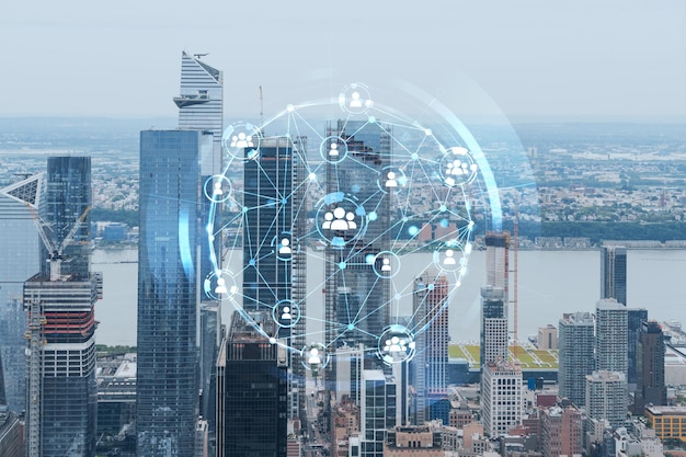 Vue aérienne panoramique sur la ville de West Side Manhattan et du quartier de Hudson Yards pendant la journée NYC USA Hologramme de médias sociaux Concept de mise en réseau et d'établissement de nouvelles relations entre les personnes