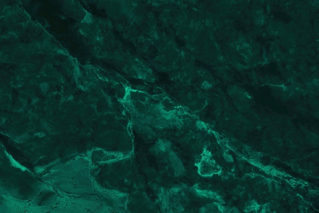 Vue de dessus du fond de texture marbre vert foncé, carrelage en pierre naturelle