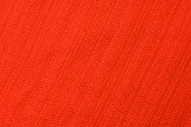 Vue de dessus de fond de texture textile abstrait aux tons rouges