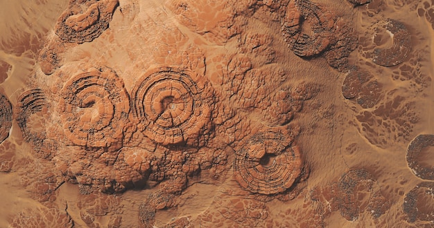 Vue de dessus de la météorite sur fond de paysage de sable