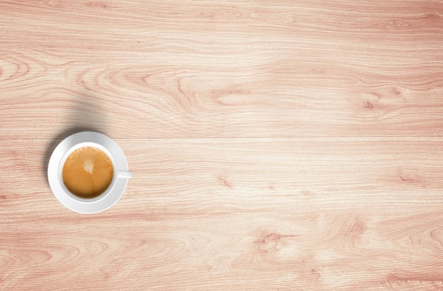 Vue de dessus des tasses à café isolées sur une table en bois