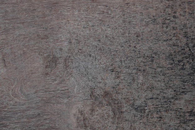 Photo vue de dessus de la texture du vieux bois en bois brun foncé naturel pour le fond