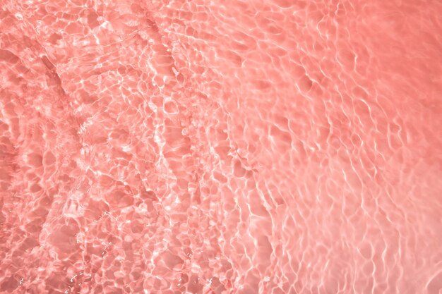 Vue de dessus de la texture de l'eau sur rose