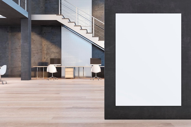 Vue de face sur une affiche blanche vierge sur un mur sombre dans un bureau de coworking spacieux de style loft avec un mur en béton d'escalier en bois et des lieux de travail confortables maquette de rendu 3D