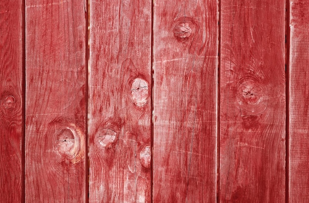 Vue de face de la cornaline à motifs verticaux Texture de mur en bois rouge grunge