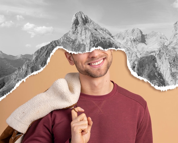 Vue de face smiley homme et collage de montagne