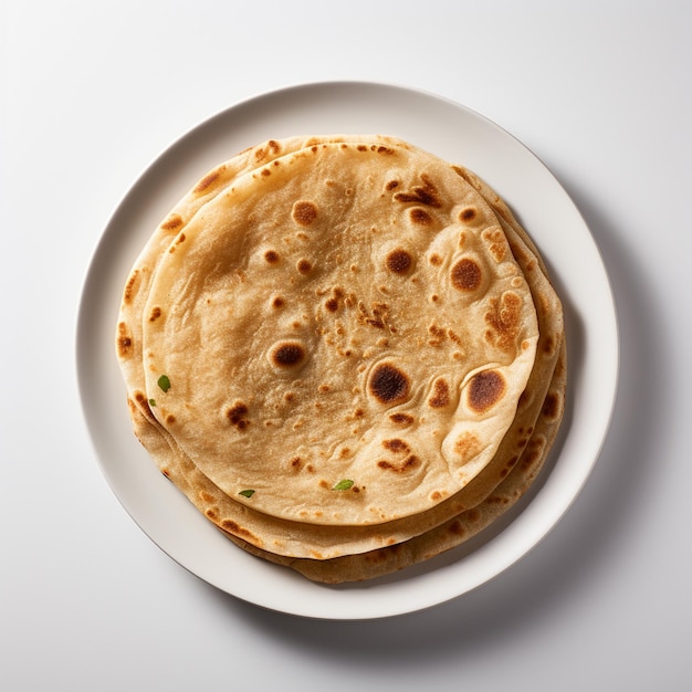 Une vue de haut de chapati avec un fond blanc